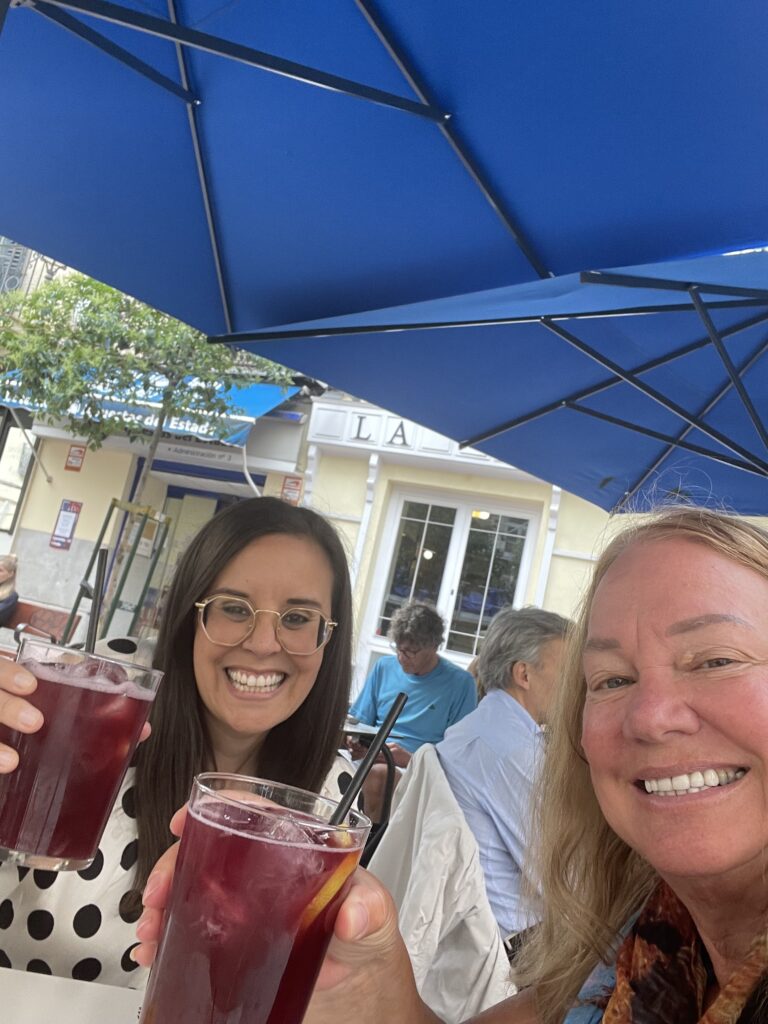 Friends sharing sangria in a Spanish Cafe