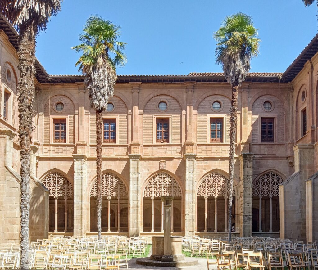 Monastery cloisters with three palm trees